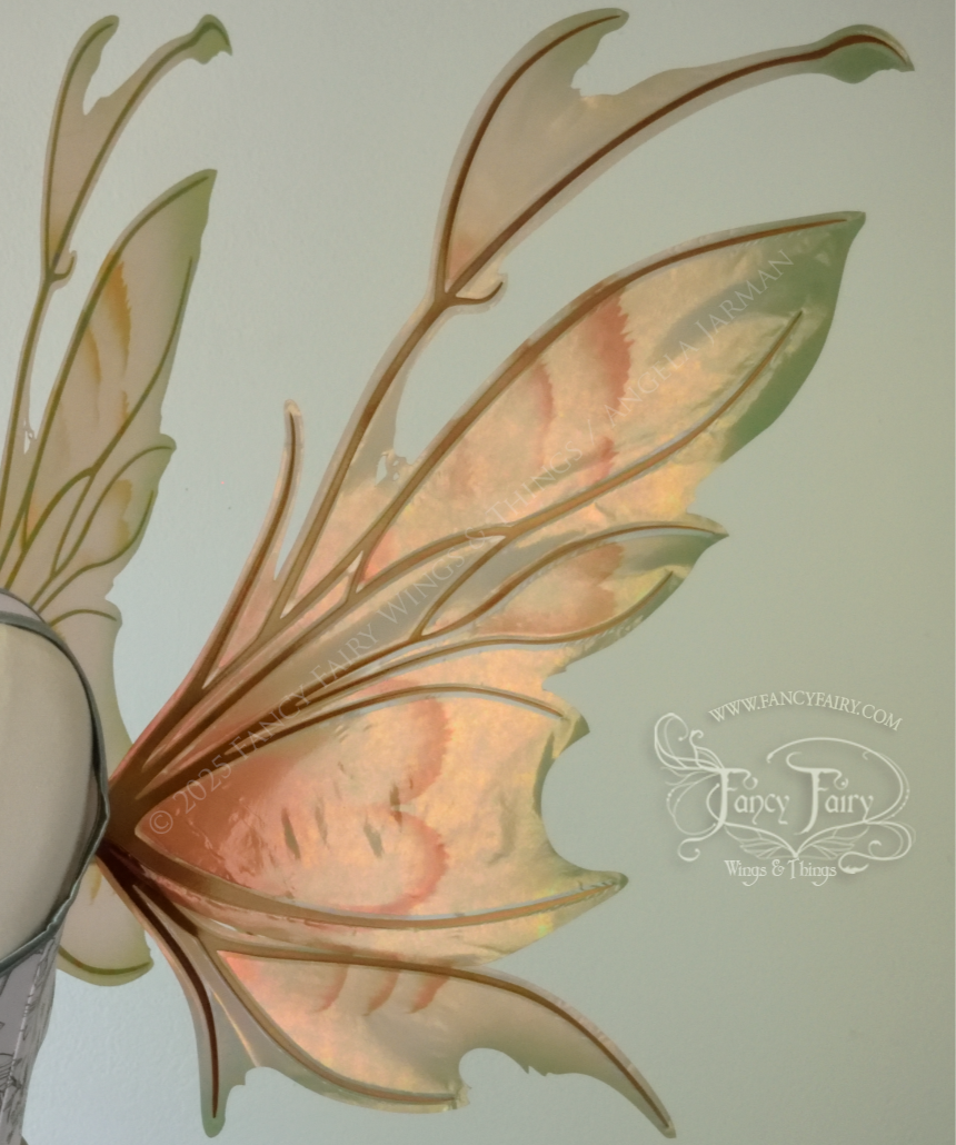 Rose Gold iridescent fairy wings with antennae and brown & olive green accents, copper veins, worn on a dress form, right side view