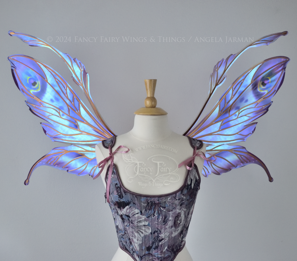 Large mauve, plum and blue iridescent fairy wings with antennae, copper veins, worn with a purple bodice on a dress form