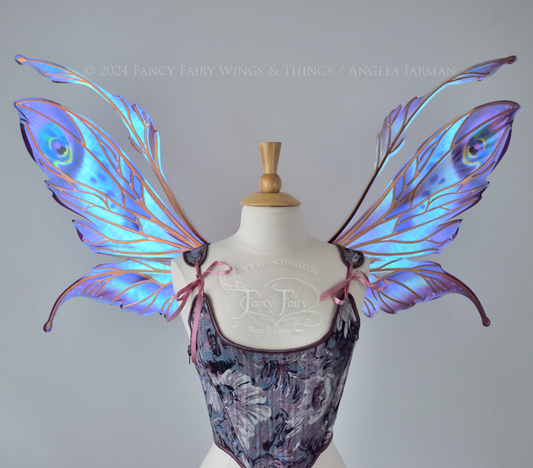 Large mauve, plum and blue iridescent fairy wings with antennae, copper veins, worn with a purple bodice on a dress form