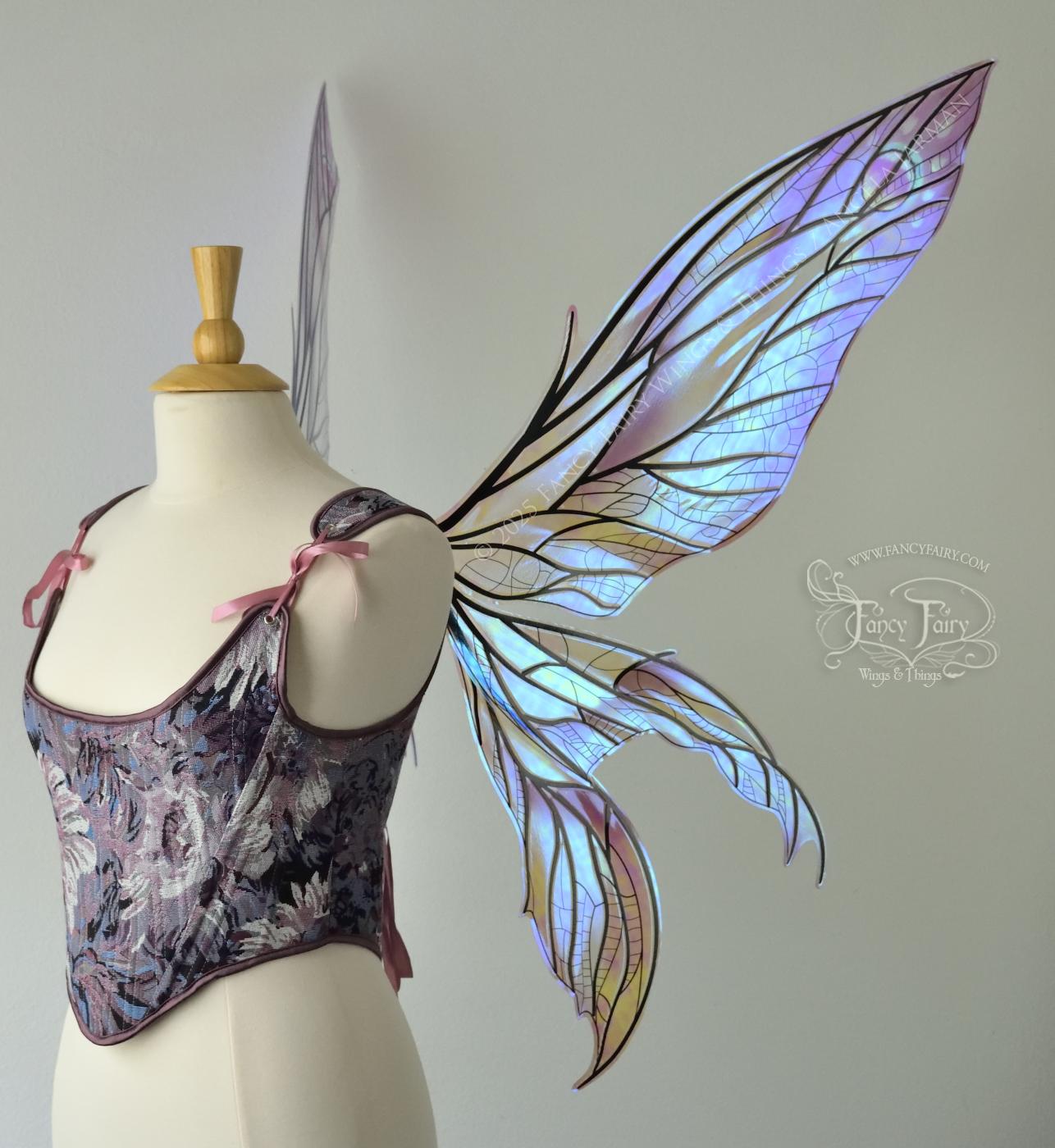 Large dragonfly-like transparent & iridescent blue & mauve fairy wings with black veins, 3 panels on each side, worn on dress form, right side view