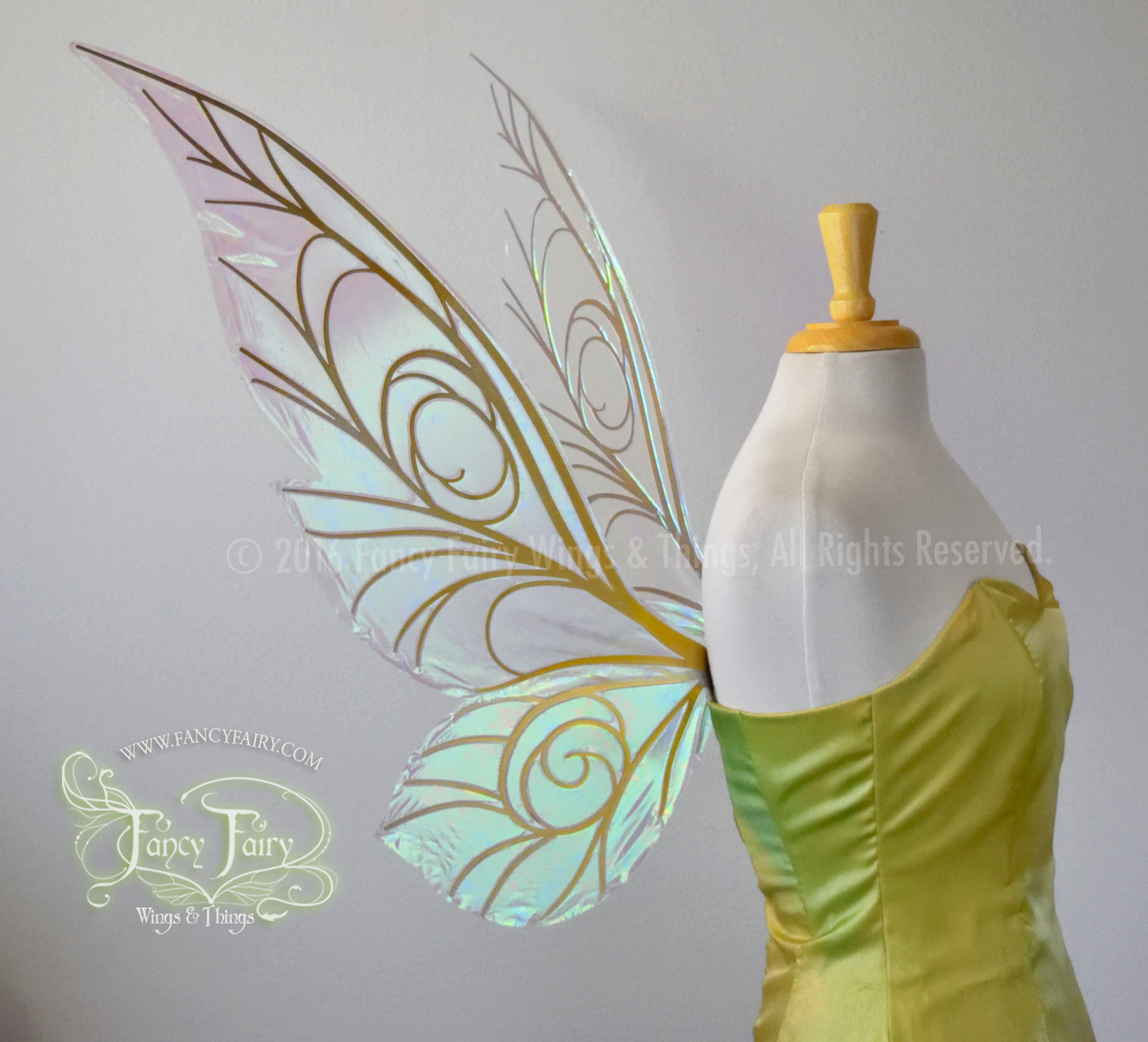 Left side view of transparent Satin White iridescent Tinker Bell inspired fairy wings with swirly gold veins, displayed on a dress form