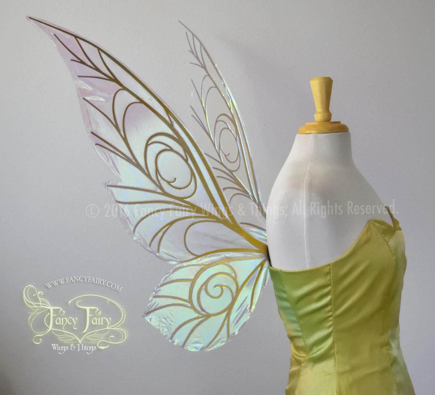 Left side view of transparent Satin White iridescent Tinker Bell inspired fairy wings with swirly gold veins, displayed on a dress form