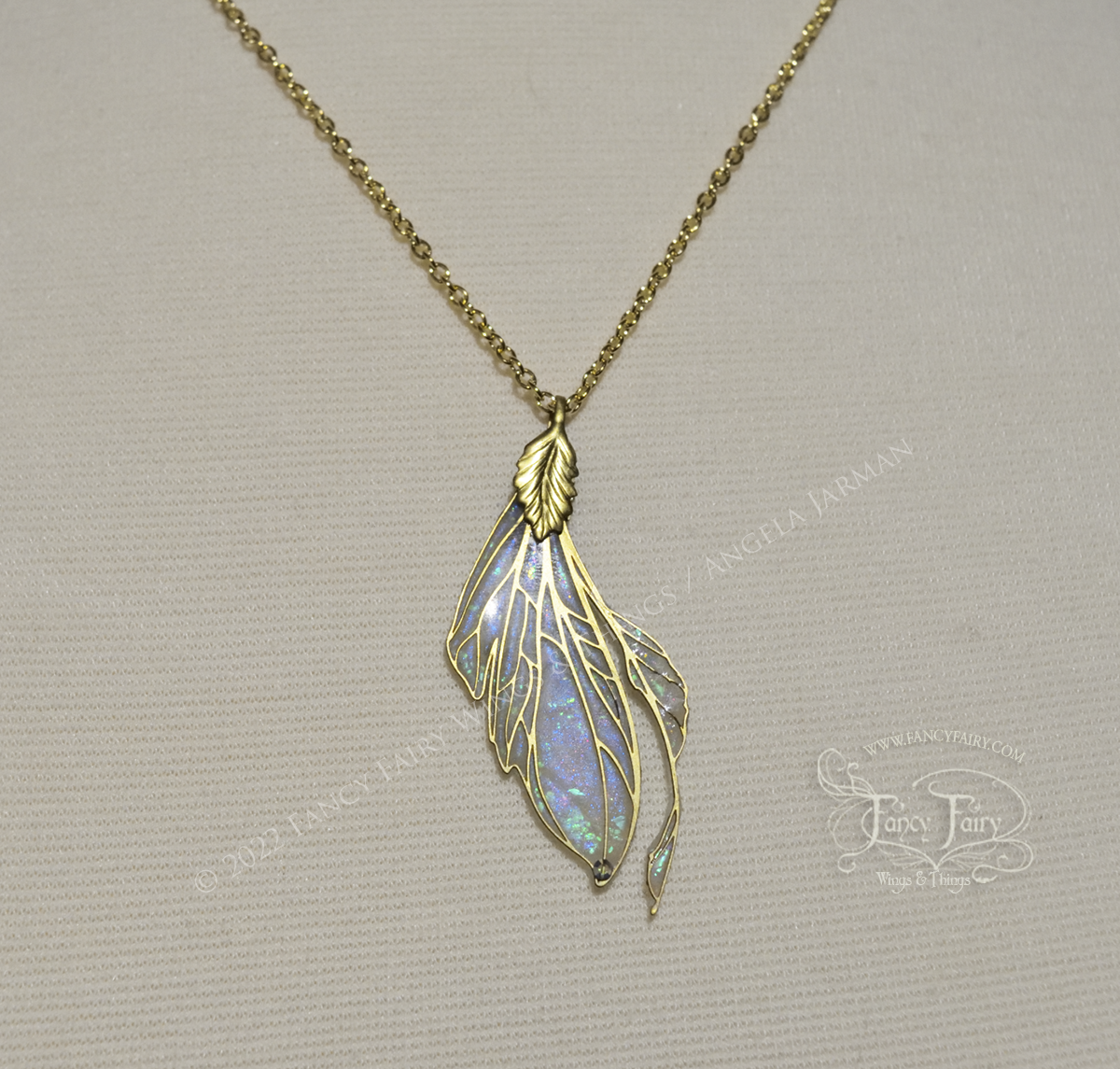 Datura Fairy Wing Necklace in Brass and Faux Opal - Left Facing